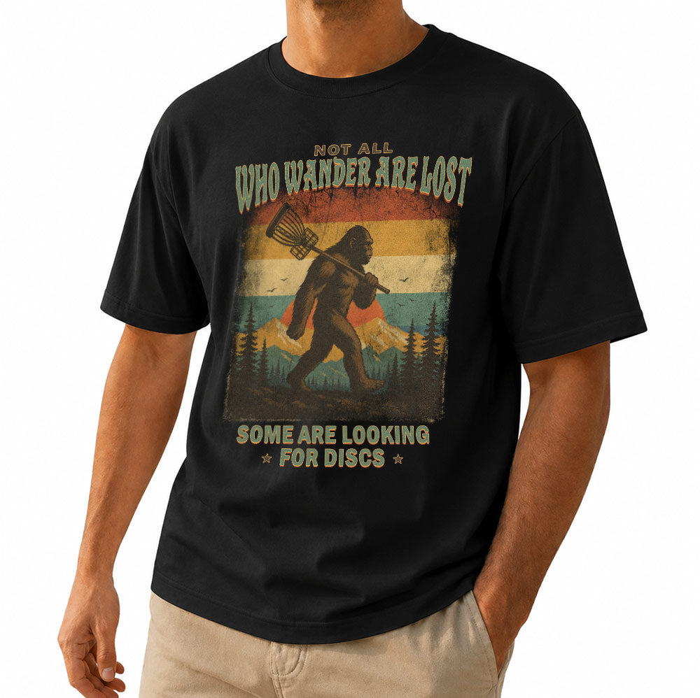 Funny Not All Who Wander Are Lost Disc Golfing Bigfoot Unisex T-Shirt - Sasquatch Golfer Graphic Tee