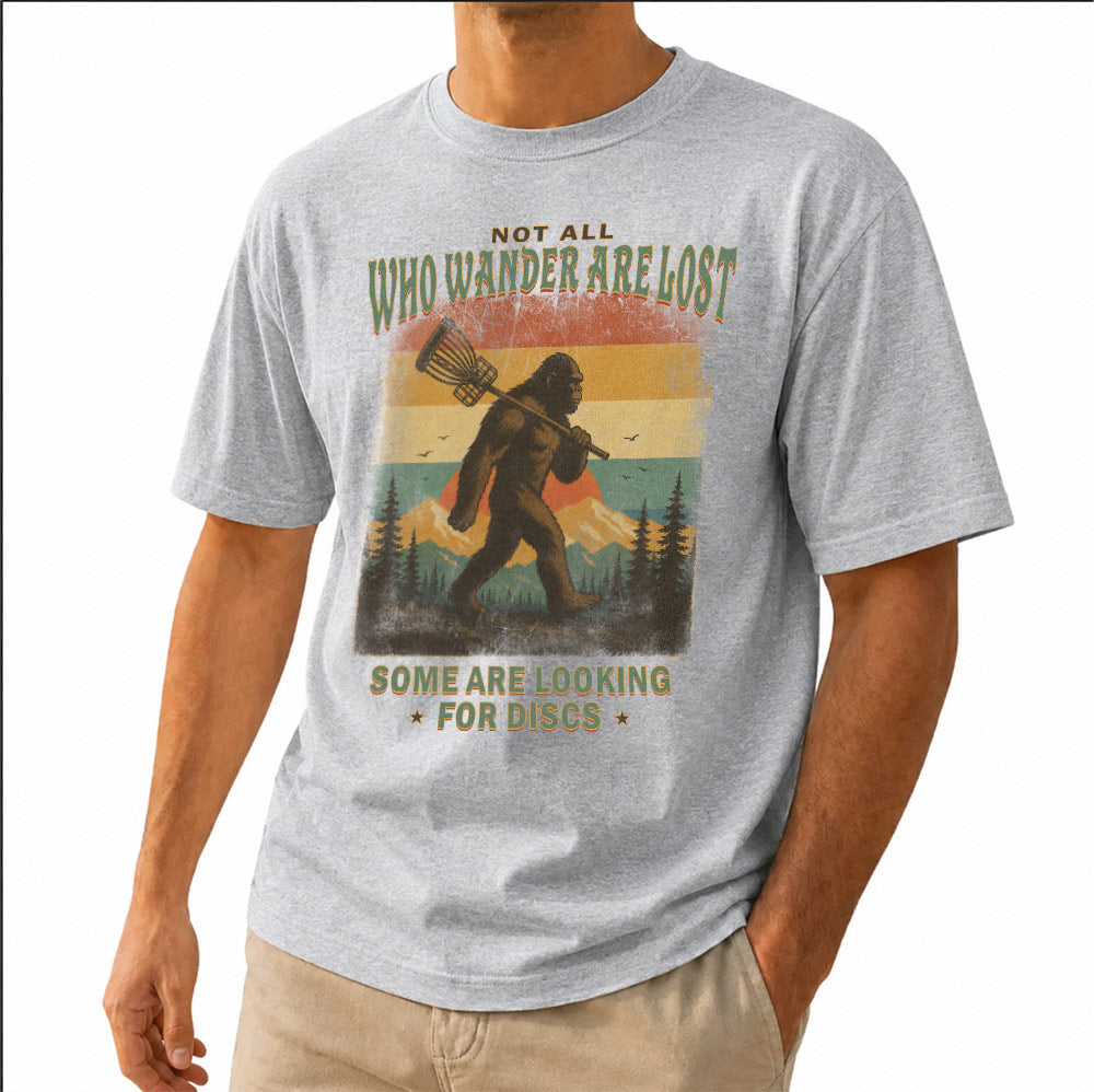 Funny Not All Who Wander Are Lost Disc Golfing Bigfoot Unisex T-Shirt - Sasquatch Golfer Graphic Tee