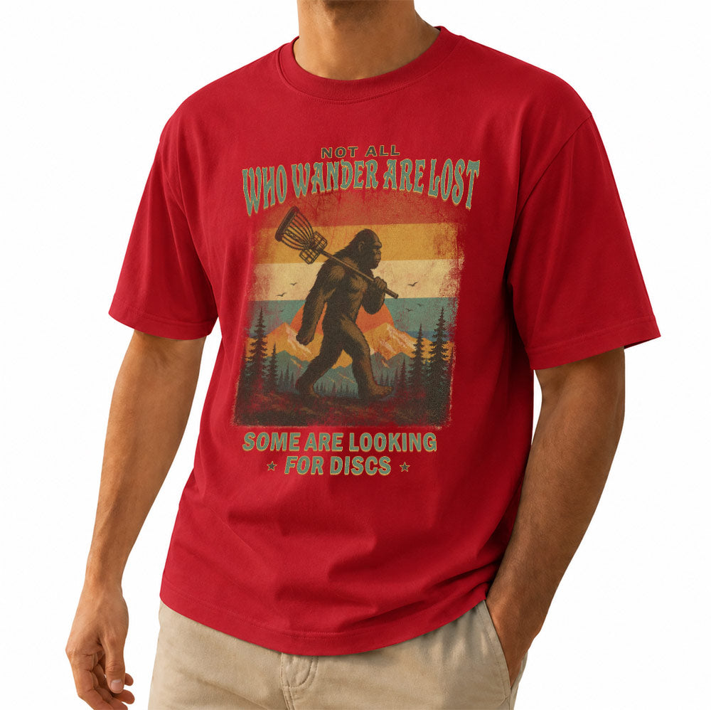 Funny Not All Who Wander Are Lost Disc Golfing Bigfoot Unisex T-Shirt - Sasquatch Golfer Graphic Tee