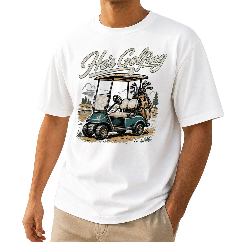 Retro golf cart t-shirt with He's Golfing print in white